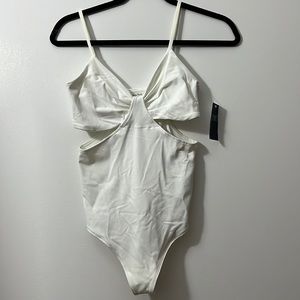 Abercrombie white cut out thong bodysuit. New with tags! Perfect summer top
